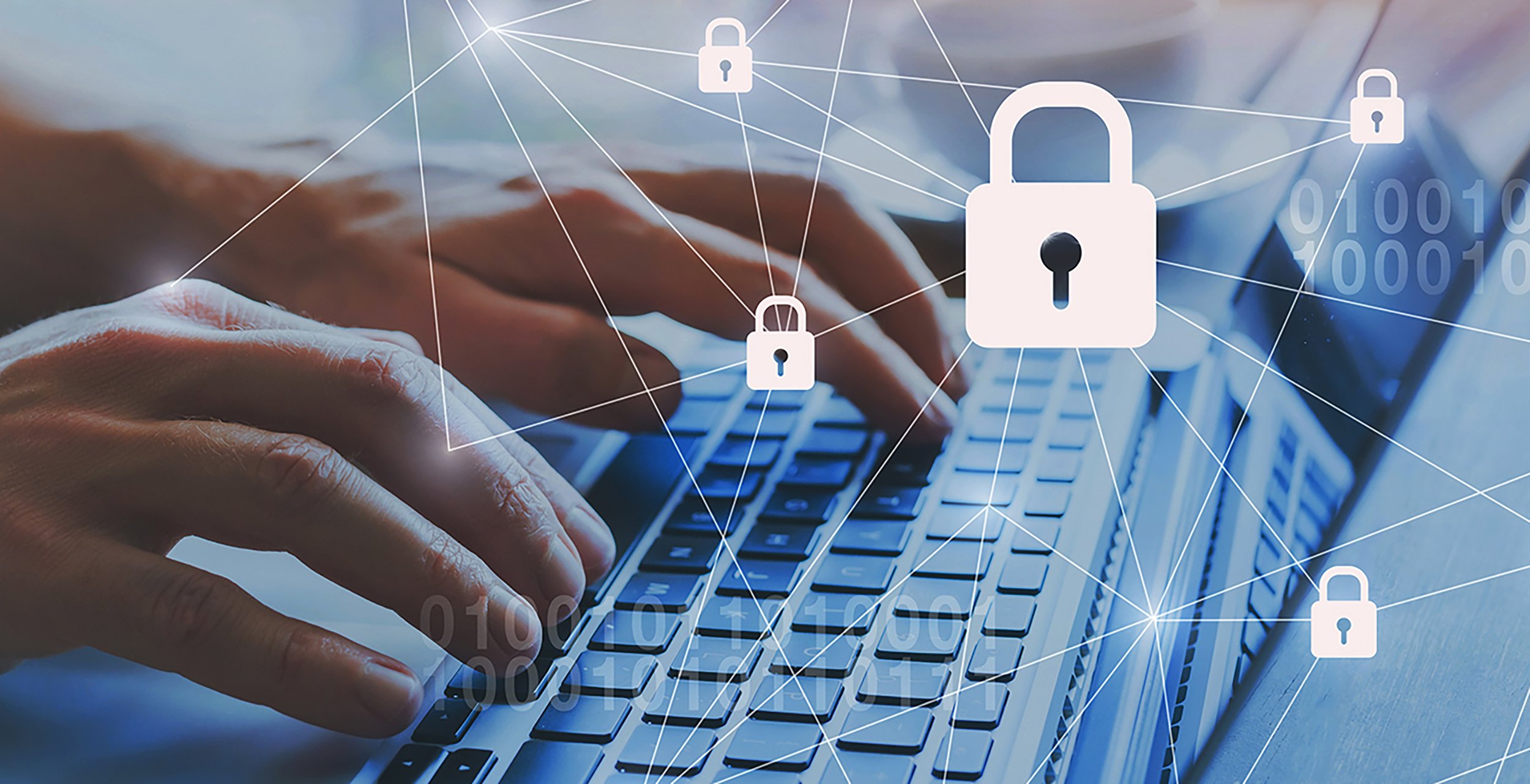 Hands typing on keyboard with privacy locks
