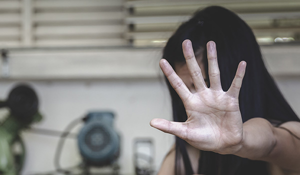 Young girl with her outstretched hand in a 