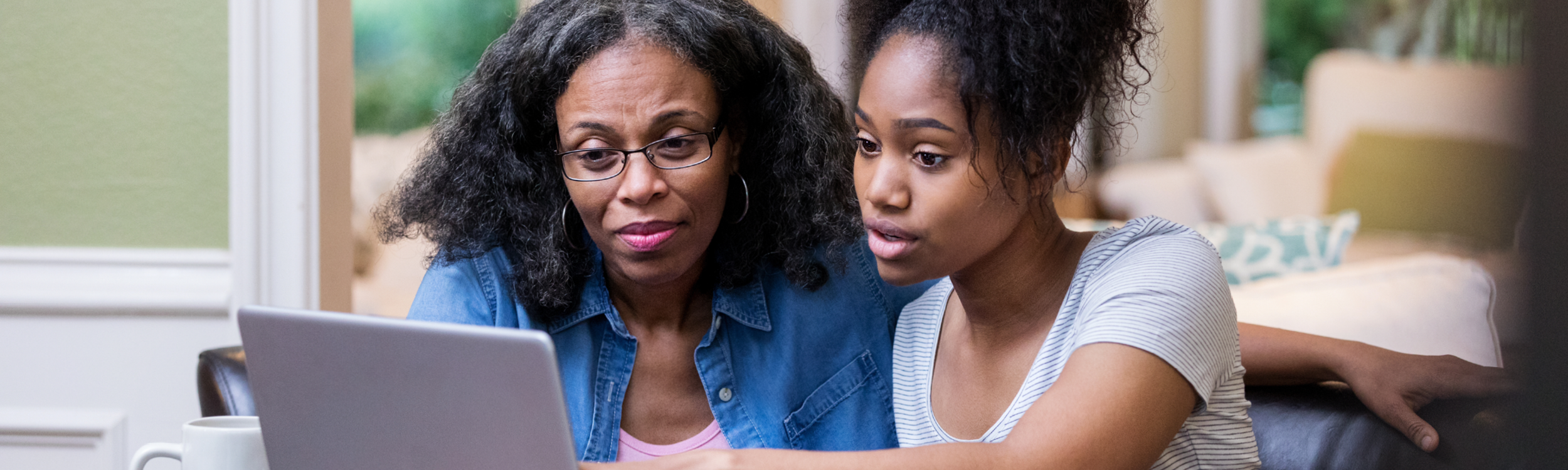 Parent and student at device