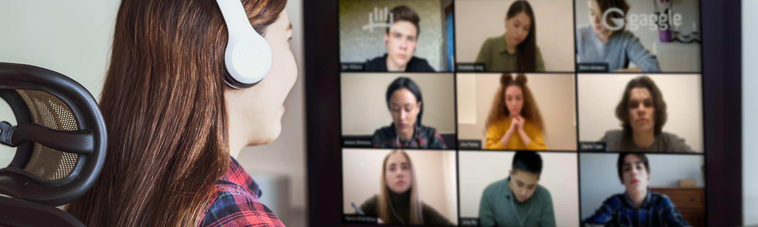 Student learning virtually with classmates on screen