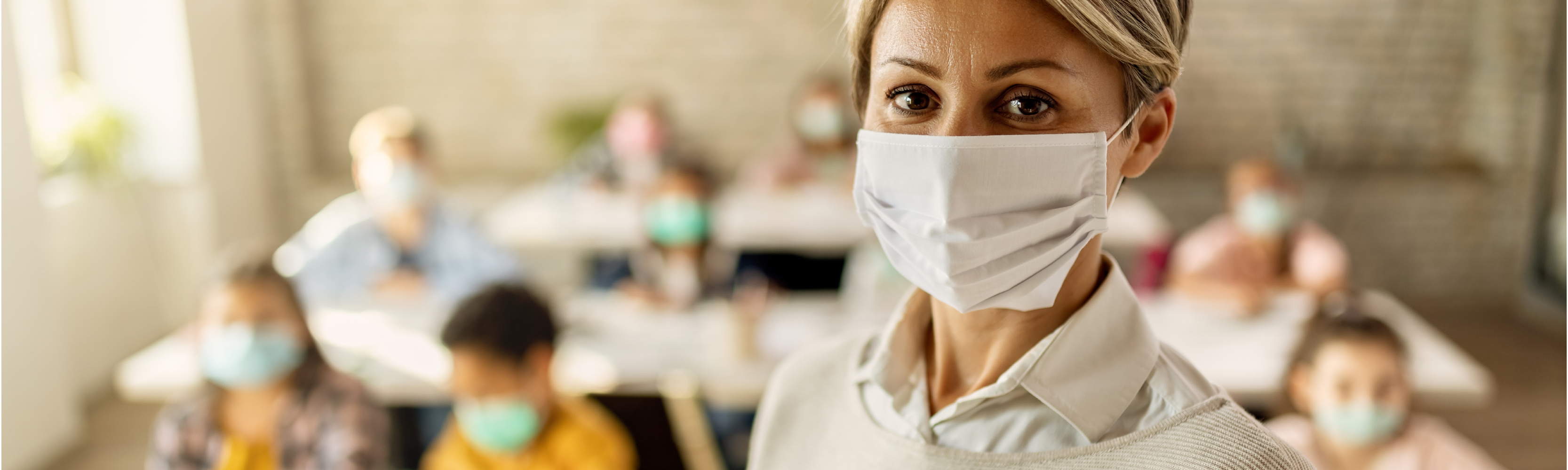 Educator wearing mask in classroom