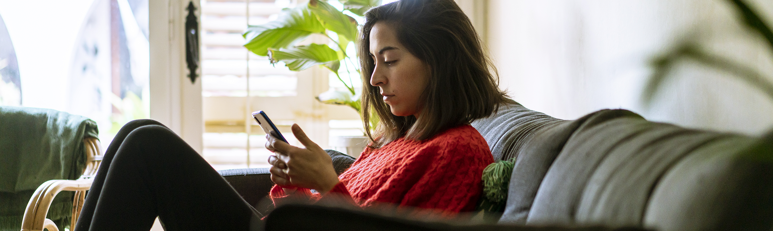 Woman on phone at home