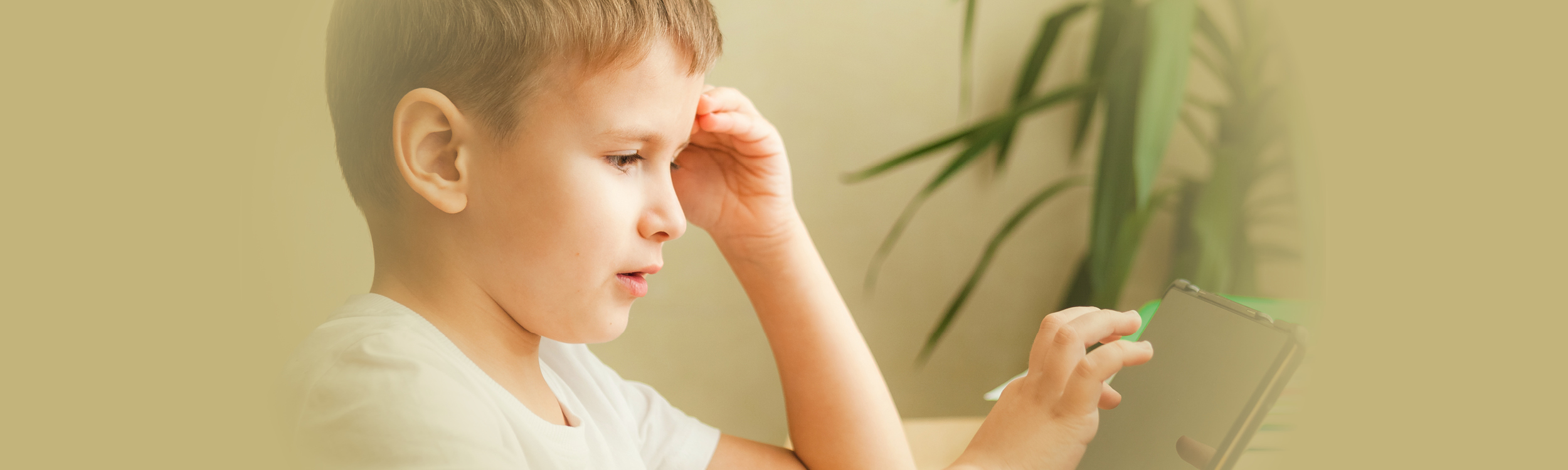 Young student at device