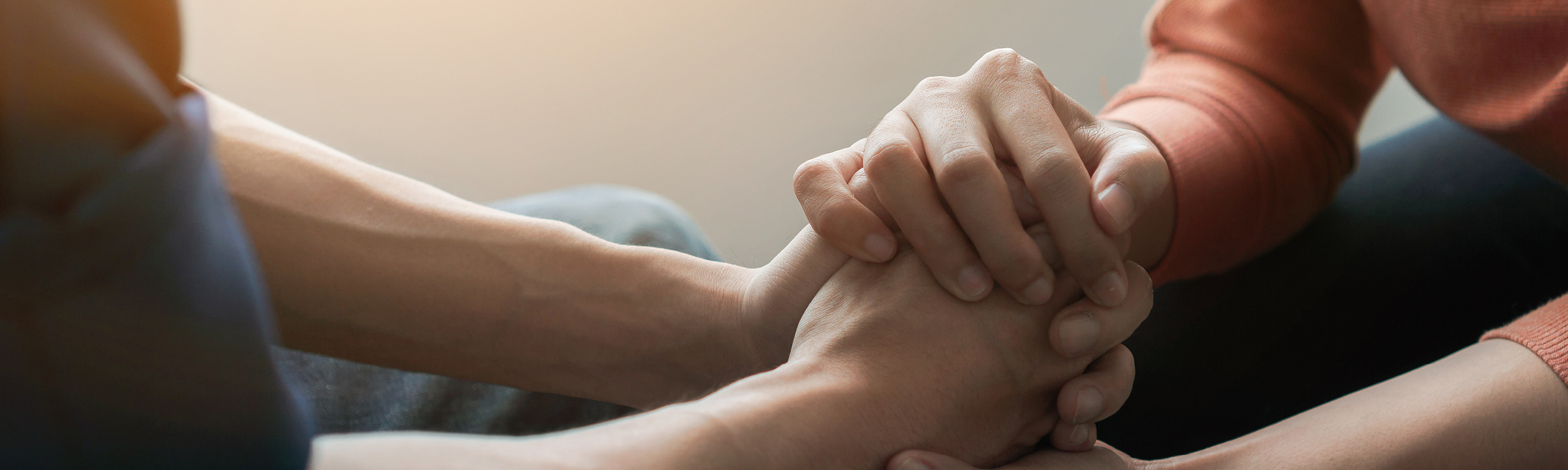 Hands clasped in support